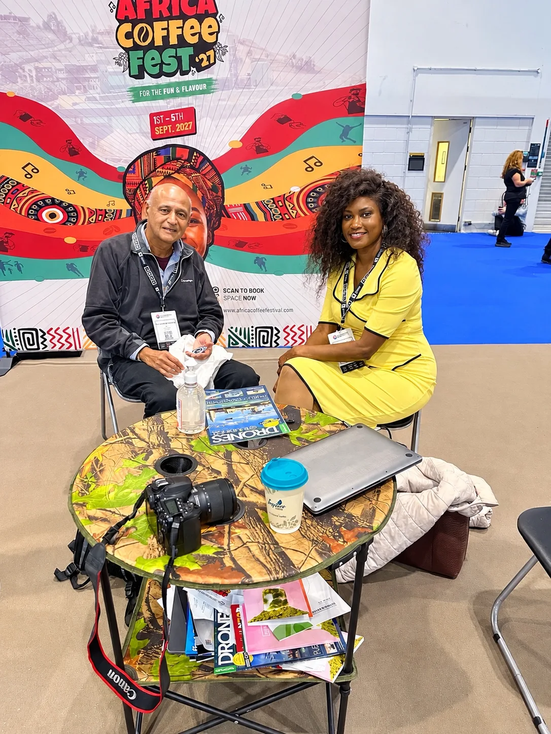 Doris Beth Atigo at a coffee exhibition stand during a food expo at ExCeL London.
