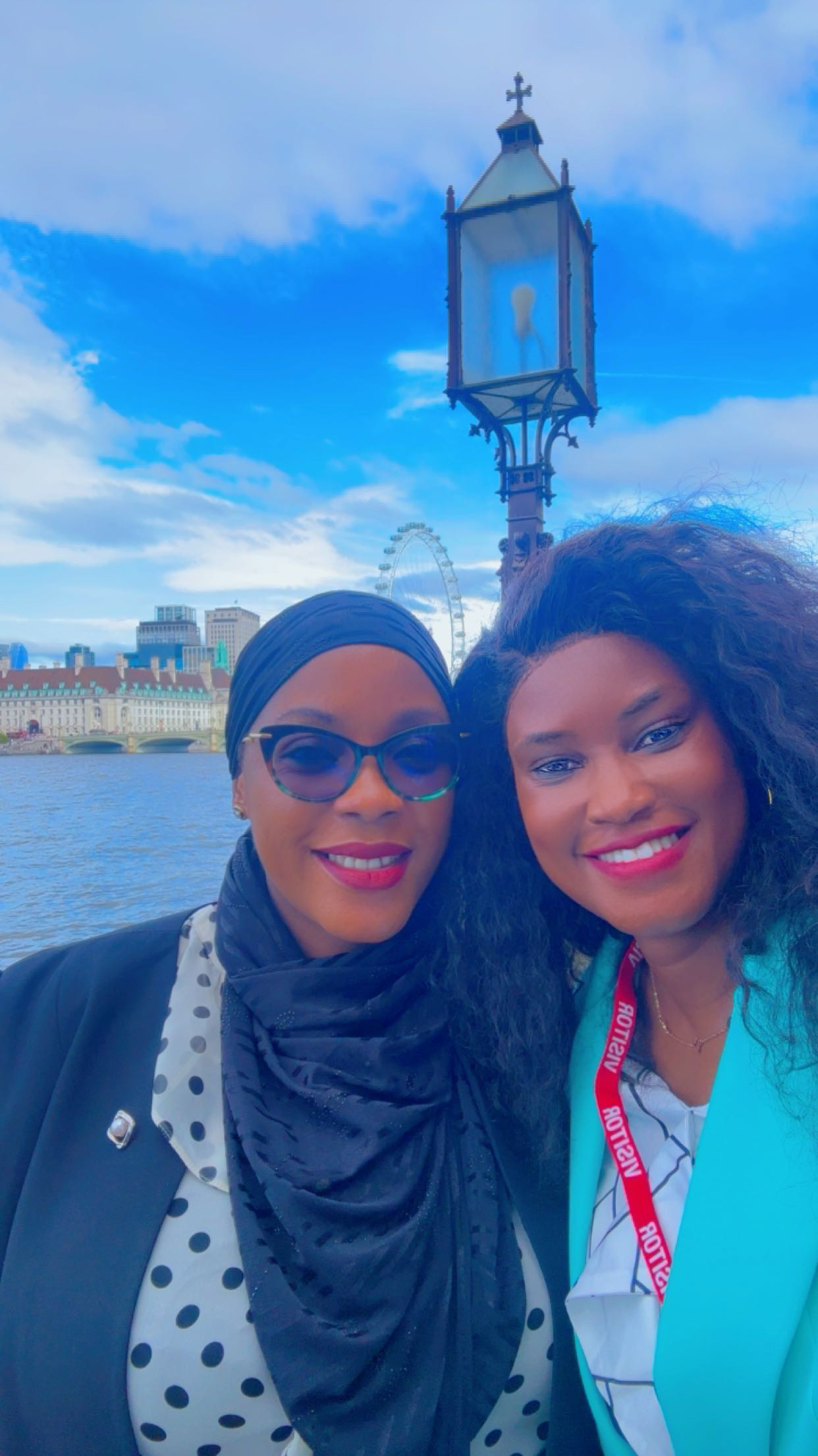 Doris and a fellow participant beside the Thames in London.