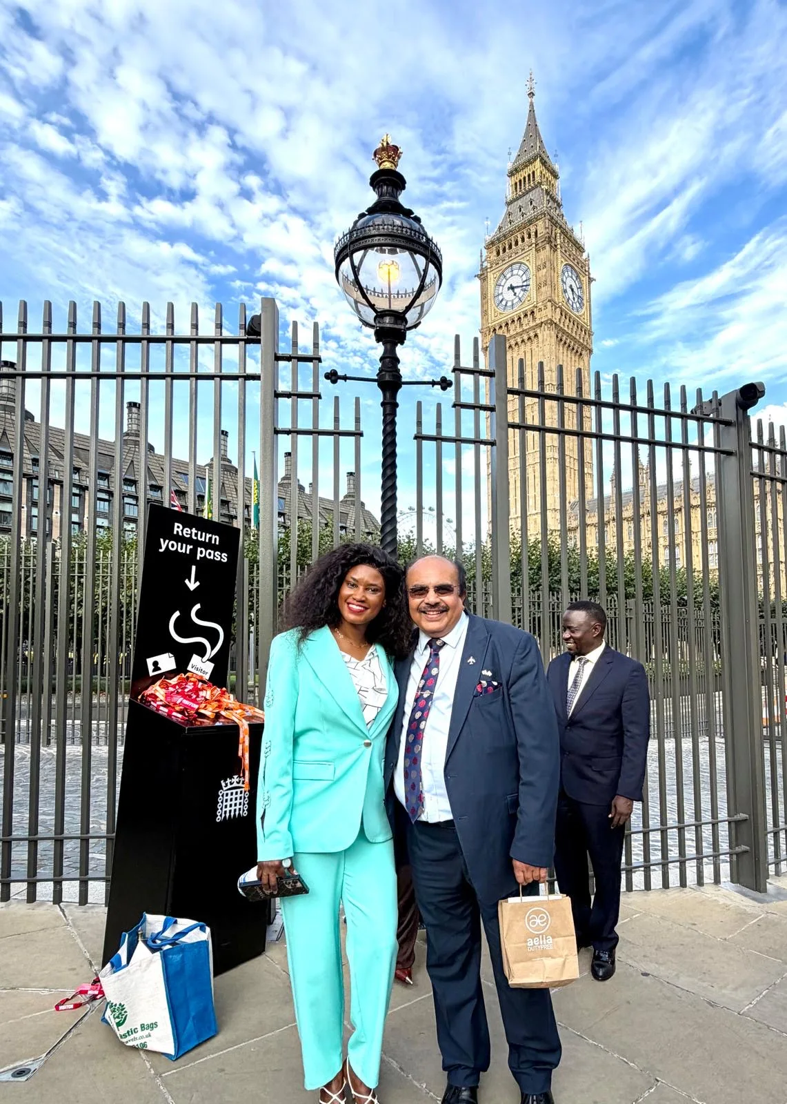 Doris Beth Atigo with fellow luncheon guests outside Parliament in London.